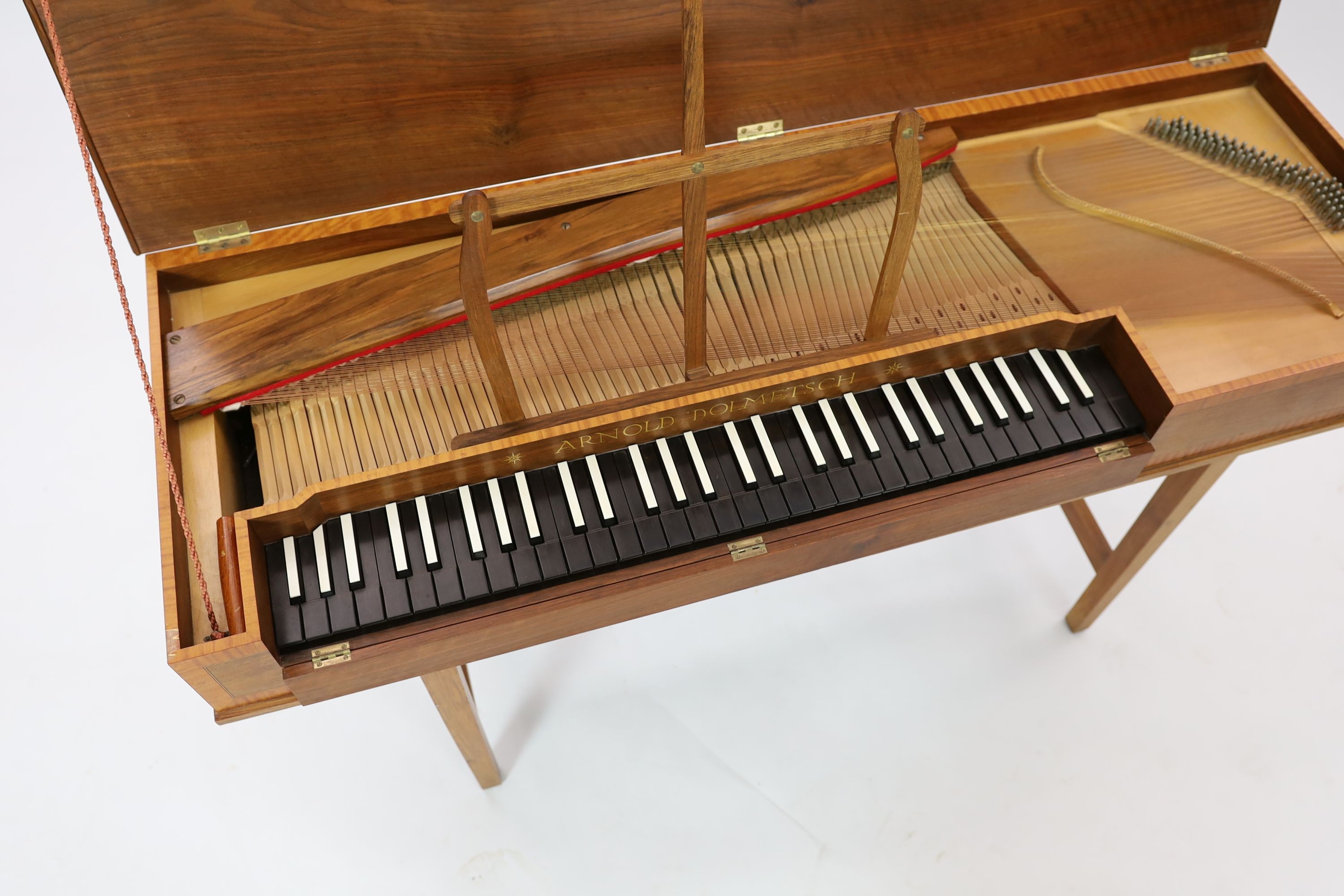 An Arnold Dolmetsch of Haslemere clavichord, width 128cm depth 44cm height 76cm